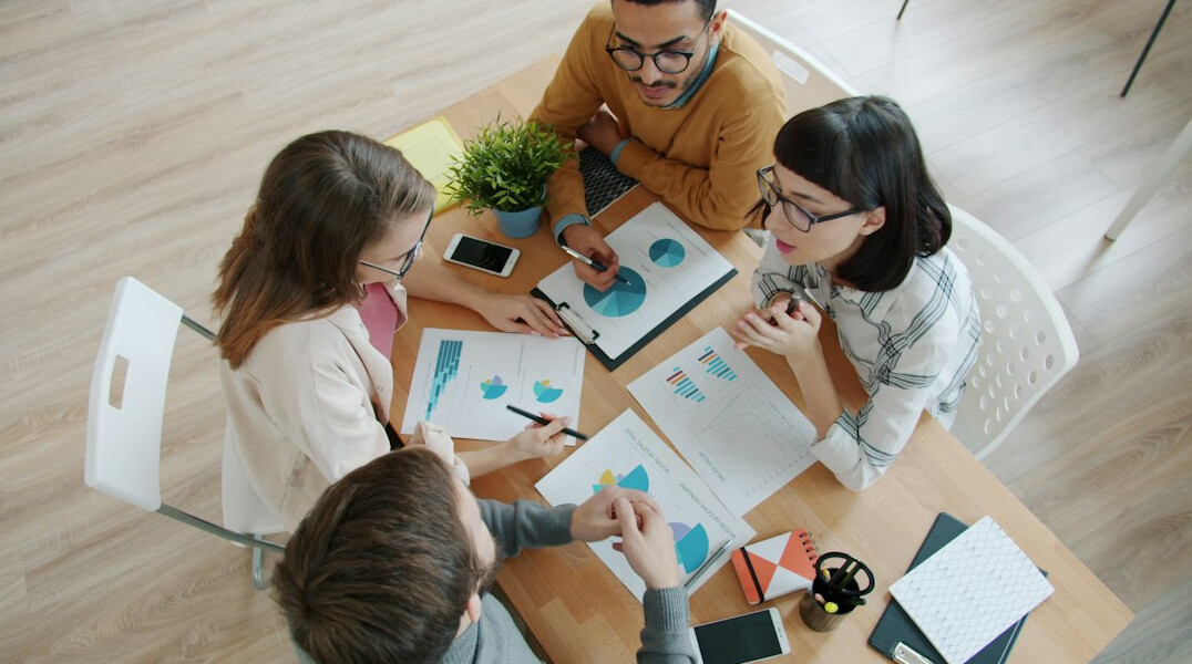 team discussing ai strategy