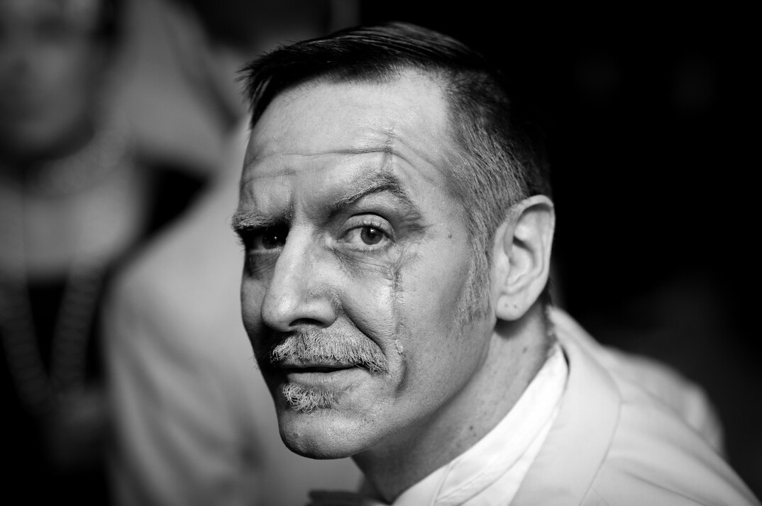 Portrait of a man in a suit with a friendly expression