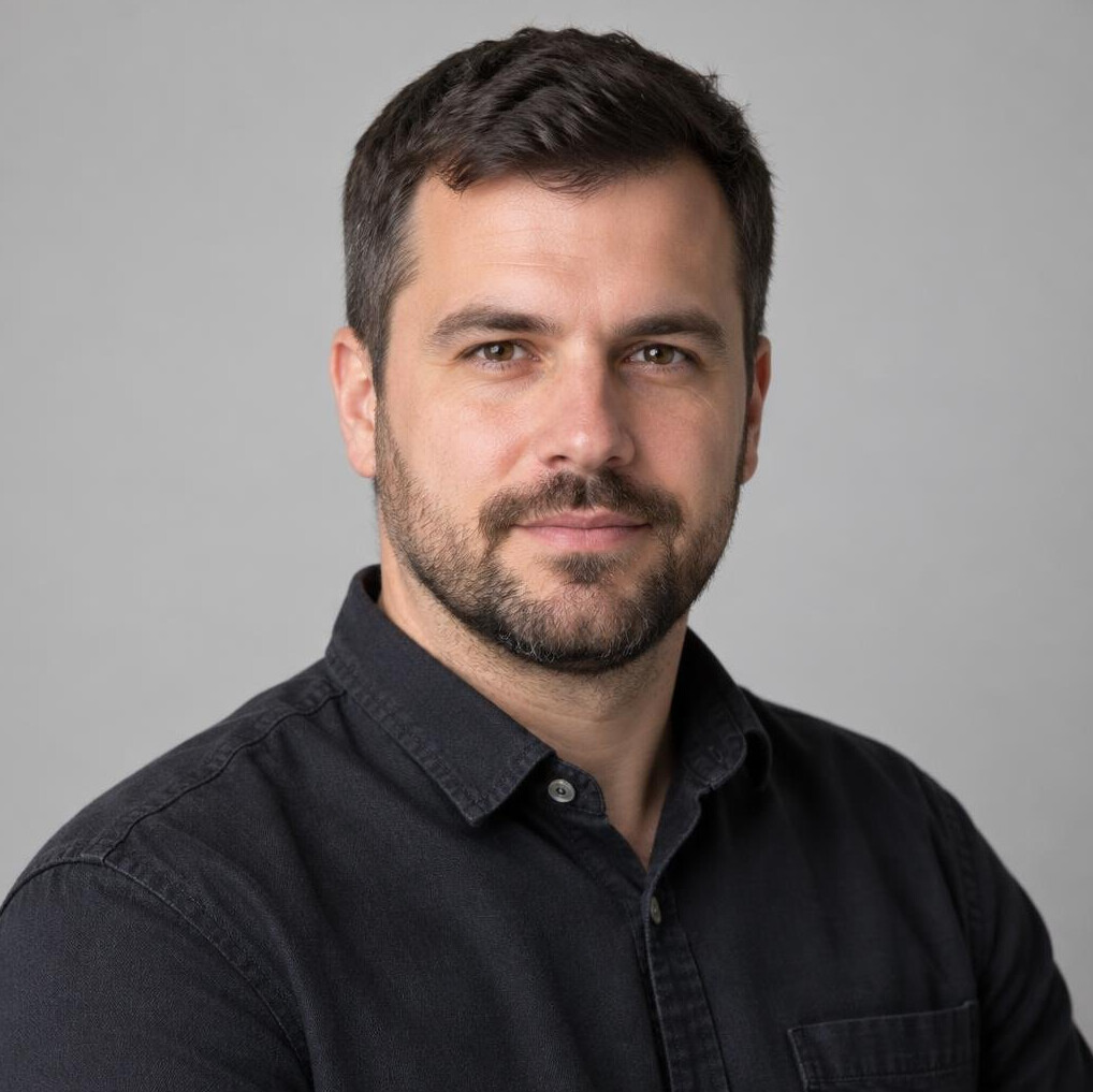 Portrait of a bearded man looking at the camera